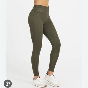 Olive green suede leggings. Wore once.They are a tight medium with some stretch.